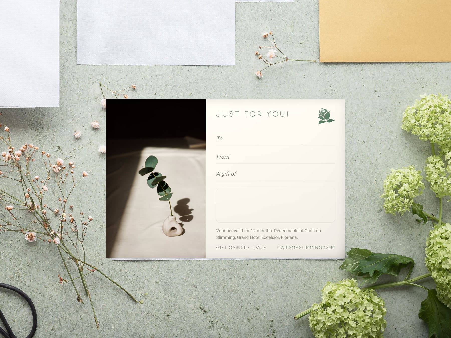 Just For You Carisma Slimming gift card, styled flat-lay